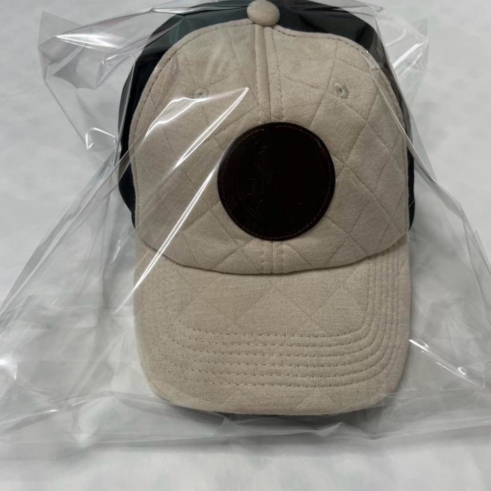 Quilted Beige luxury hat with Dark Leather Patch